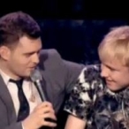 Michael Buble sings with a 15 year-old boy